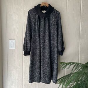 Corey Lynn Calter Cowl Neck dress in black. Knit cowl and sleeve cuffs